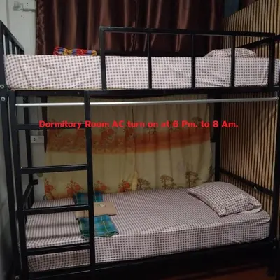 a bunk bed in a room with a bunk bed gmaxwell gmaxwell gmaxwell gmaxwell at Sleepwith me Hostel in Bangkok