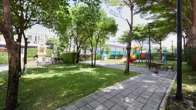 a park with a playground with a slide at Citiresort Living sukhumvit 39 in Makkasan