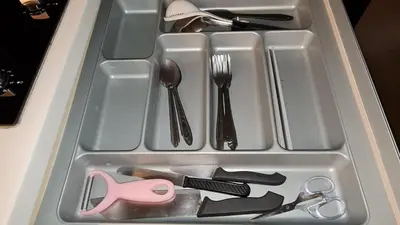 a drawer filled with utensils and utensils sidx sidx sidx sidx sidx at 1BR Thonglor , Fast WiFi , Near Samitivej , Nightlife in Khlong Toei