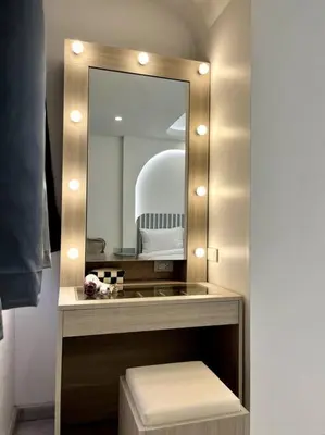 a bathroom with a large mirror and a sink at DiscoveryHome2 at Pratunammarket in Bangkok