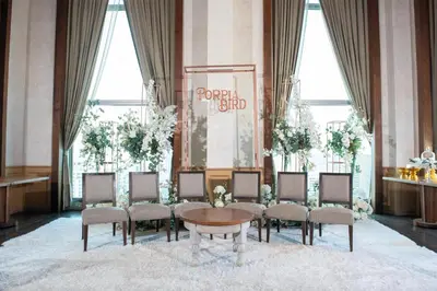 a group of chairs and a table in a room at Radisson Blu Plaza Bangkok in Bangkok