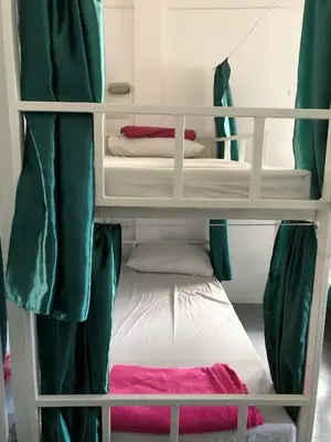 a couple of bunk beds in a room at PLOY Hostel in Bangkok