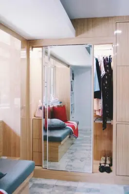 a room with a mirror and a room with a chair at Double Studio, Private Bath, Shared Kitchen with Local Family by Pillows & Purrs in Bangkok