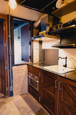 a kitchen with a sink and a counter top at New York Loft & Japanese Magic by V4SKIN in Bangkok