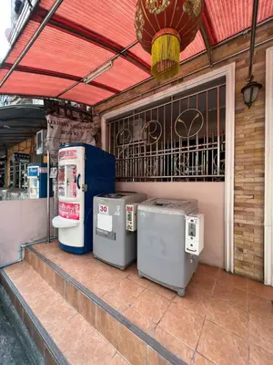 a group of machines sitting on a patio at Pimravee Apartment (Yaek 8) in Ban Zong Katiam