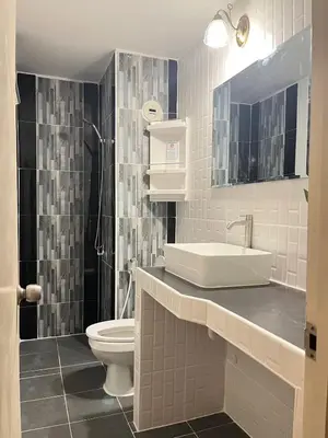 a bathroom with a sink and a toilet at T12 Popular Condo By : hunnity in Ban Bang Phang