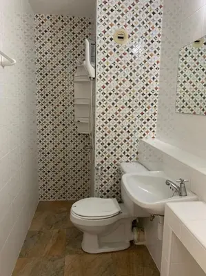 a bathroom with a toilet and a sink at Popular The best muangthongthani \u65e5\u5e38\u623f\u95f4\u516c\u5bd3 in Ban Bang Phang