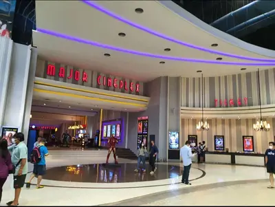 a shopping mall with people standing in the middle at The Parkland Condominium in Bangkok