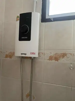 a air conditioner on a wall in a bathroom at Viriyapon in Bangkok