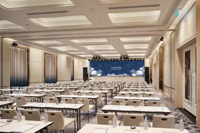 an image of a classroom with tables and chairs at Grande Centre Point Surawong Bangkok in Bangkok
