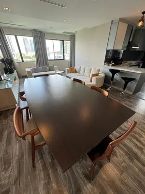a large living room with a large table and chairs at W8 CONDO, TOP Floor LUXE 3 Bedroom Penthouse, Hip central Bangkok area, 5 mins from Thonglo BTS station in Bangkok