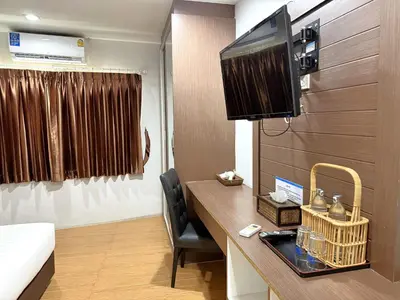 a bathroom with a sink in a room at Bed By Cruise Hotel At Samakkhi-Tivanont in Nonthaburi