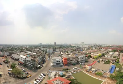 an aerial view of a city with buildings at Happyland Mansion in Bangkok