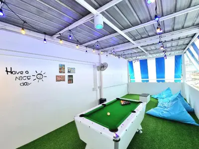 a room with a pool table in the middle of it at k4 be chill *Wongwianyai BTS_80m*Family&Friend* in Godown