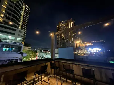 a view of a city skyline at night at Comfy Crib Hostel in Bangkok