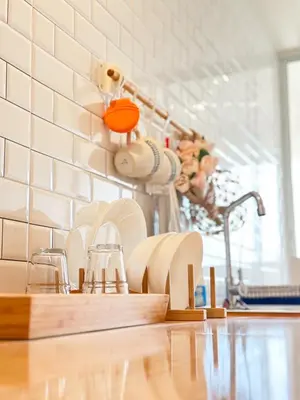 a kitchen with a counter with dishes and a sink at Happiness sleep C3 in Ban Bang Phang