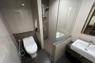 a bathroom with a toilet and a sink at Anh Anh Homestay in Bangkok