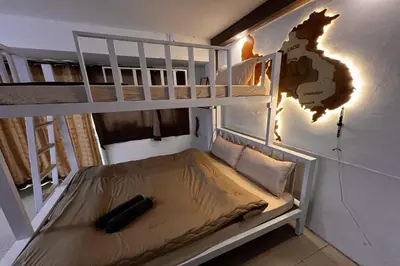 a bunk bed in a room with a bunk bedscribed at Anh Anh Homestay in Bangkok