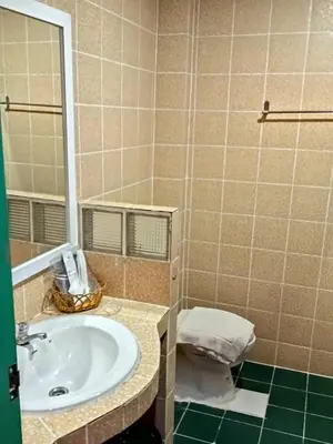 a bathroom with a sink and a toilet at Baan Sood Soi Residence 1 บ้านสุดซอย เรซิเด้นท์ 1 in Ban Bang Bamru