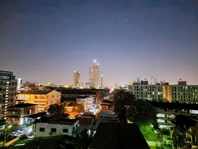 a city skyline at night with tall buildings at 814-STP Homely room Free Wi-Fi and Near BTS line in Bangkok