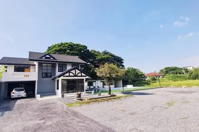 a house with a car parked in front of it at Number3 Poolvilla Bangkok in Lat Krabang