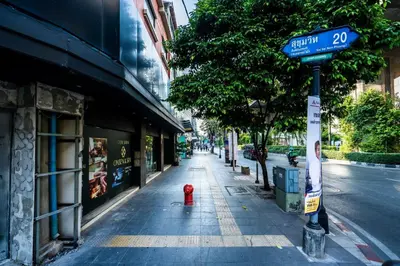 a red fire hydrant on the side of a street at XX GO INN Sukhumvit-Bts Asoke-Phrom Phong โกอินน์ สุขุมวิท in Bang Kapi