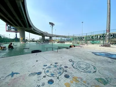 a skate park with graffiti on the ground at The Loftel Resort in Bangkok