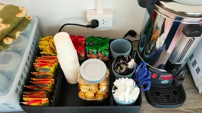 a lunch box filled with snacks and a blender at The Loftel Resort in Bangkok