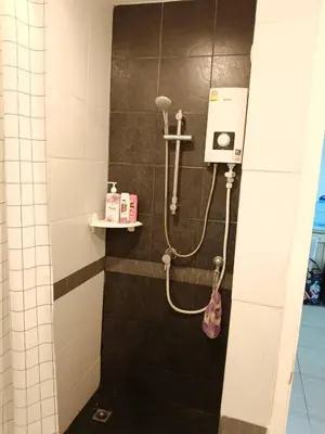 a shower in a bathroom with a shower at Green home in the big City in Bangkok