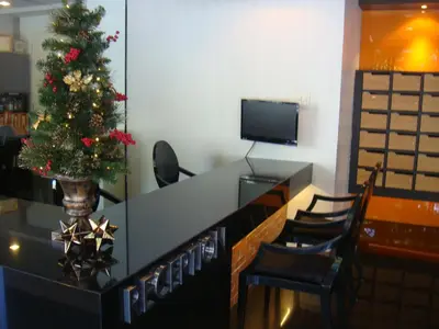a christmas tree on top of a desk in a room at Marigold Ramkhamhaeng in Bangkok
