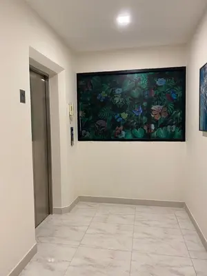 an empty room with a painting on the wall at ศิวพฤกษ์ เพลส in Nonthaburi