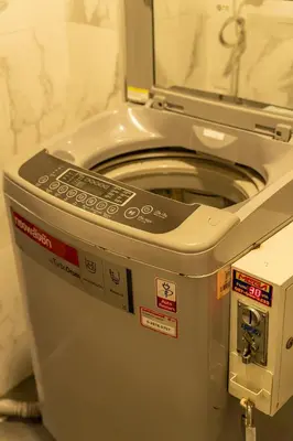 a close up of a toilet in a bathroom at 23 AVA at Saladaeng in Bangkok