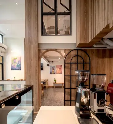 a kitchen with a blender on a counter at ZEN MASTER HOTEL in Bangkok