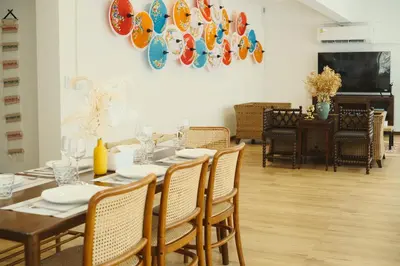 a dining room with a table and chairs at Private Full-Floor Spacious 5BR in China Town in Bangkok