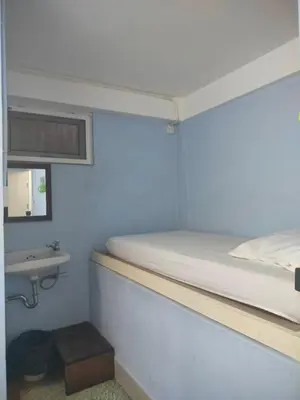 a bedroom with a bunk bed and a sink at wonderful hostel khaosan in Bangkok