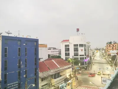 a view of a city street with traffic and buildings at wonderful hostel khaosan in Bangkok