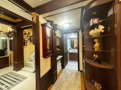 a hallway of a home with a clock on the wall at \u66fc\u8c37\u72ec\u680bLat Phrao\u7cbe\u54c1\u522b\u5885 in Bangkok