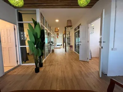a hallway with a vase with a plant in it at Roof Top 4BR Top Private Floor, china town, center in Bangkok