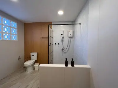 a bathroom with a shower and a toilet at Roof Top 4BR Top Private Floor, china town, center in Bangkok