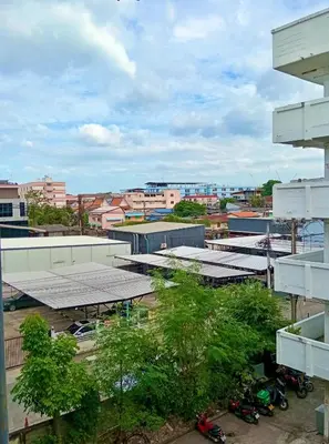 a view of a city with buildings and motorcycles at Hostel Bangkok BM B&B in Bangkok