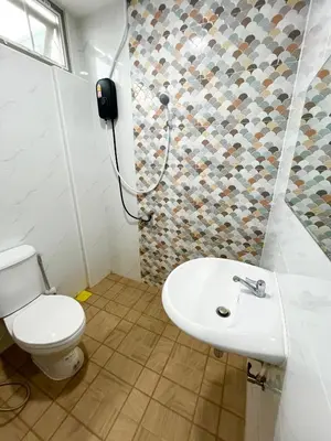 a bathroom with a toilet and a sink and a shower at Number9 Bangkoknoi BKK Homestay in Bangkok