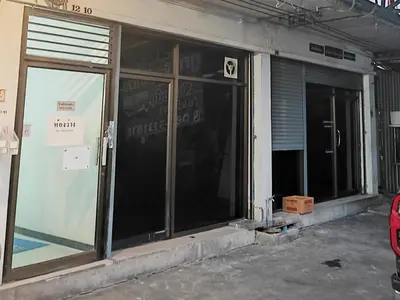 a store front with glass doors on a building at Mansion 24 in Bangkok