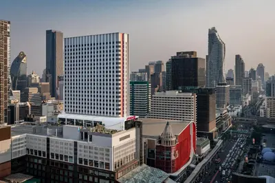 a view of a city skyline with tall buildings at Moxy Bangkok Ratchaprasong by Marriott in Bangkok