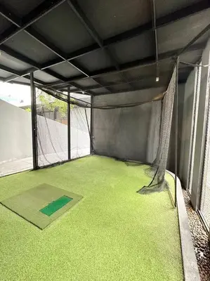 a batting cage with a net on a tennis court at Circle Rein Sukhumvit 12 two bedrooms apartment in Khlong Toei