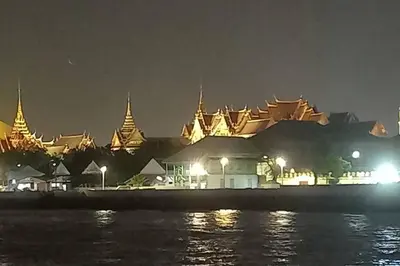 a view of a city at night from the water at Old Town- mimi cozy studio *70 SQM good for family in Bangkok