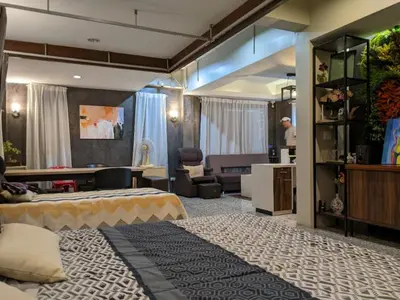 a large room with a bed and a living room at Old Town- mimi cozy studio *70 SQM good for family in Bangkok