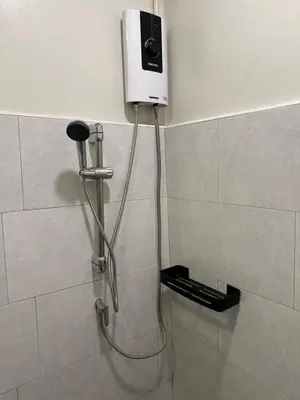 a shower in a bathroom with a shower at Victory Place in Bangkok