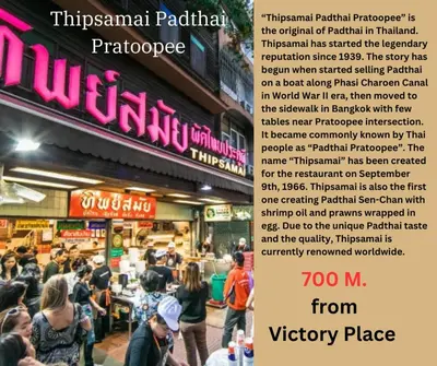 a flyer for a restaurant with a crowd of people at Victory Place in Bangkok