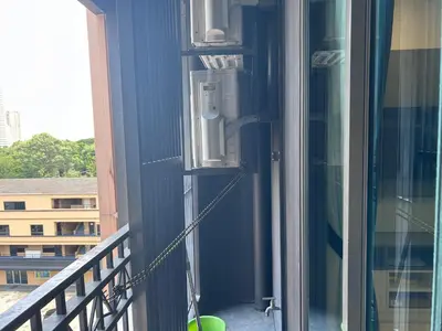 a door on the side of a balcony at Sukhumwit Soi 10 at VENiO in Khlong Toei