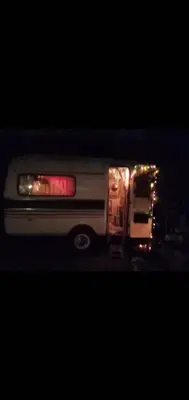 a fire truck with lights on the back of it at Caravan & Smart in Bangkok